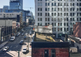 Vancouver's Seymour Building at 525 Seymour Street, a historic Late Gothic Revival architectural gem surrounded by modern skyscrapers.